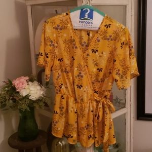 A yellow floral print shirt